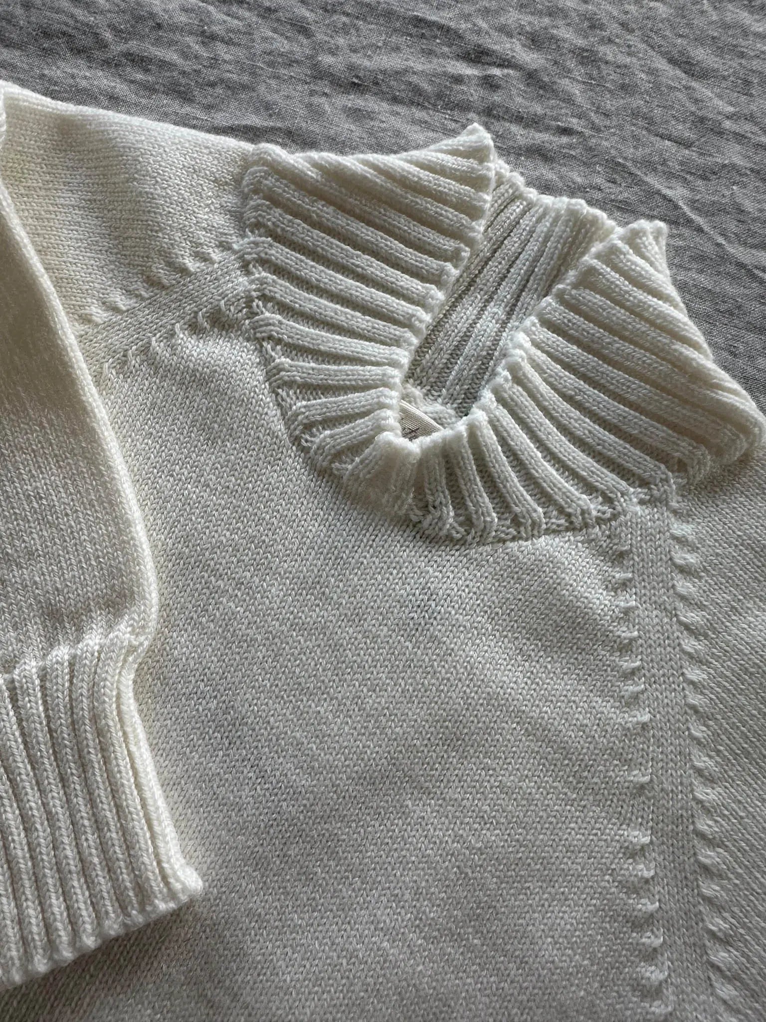 Strickgut - Warmer Babystrampler mit Ärmeln aus Merinowolle | ecru Strickgut