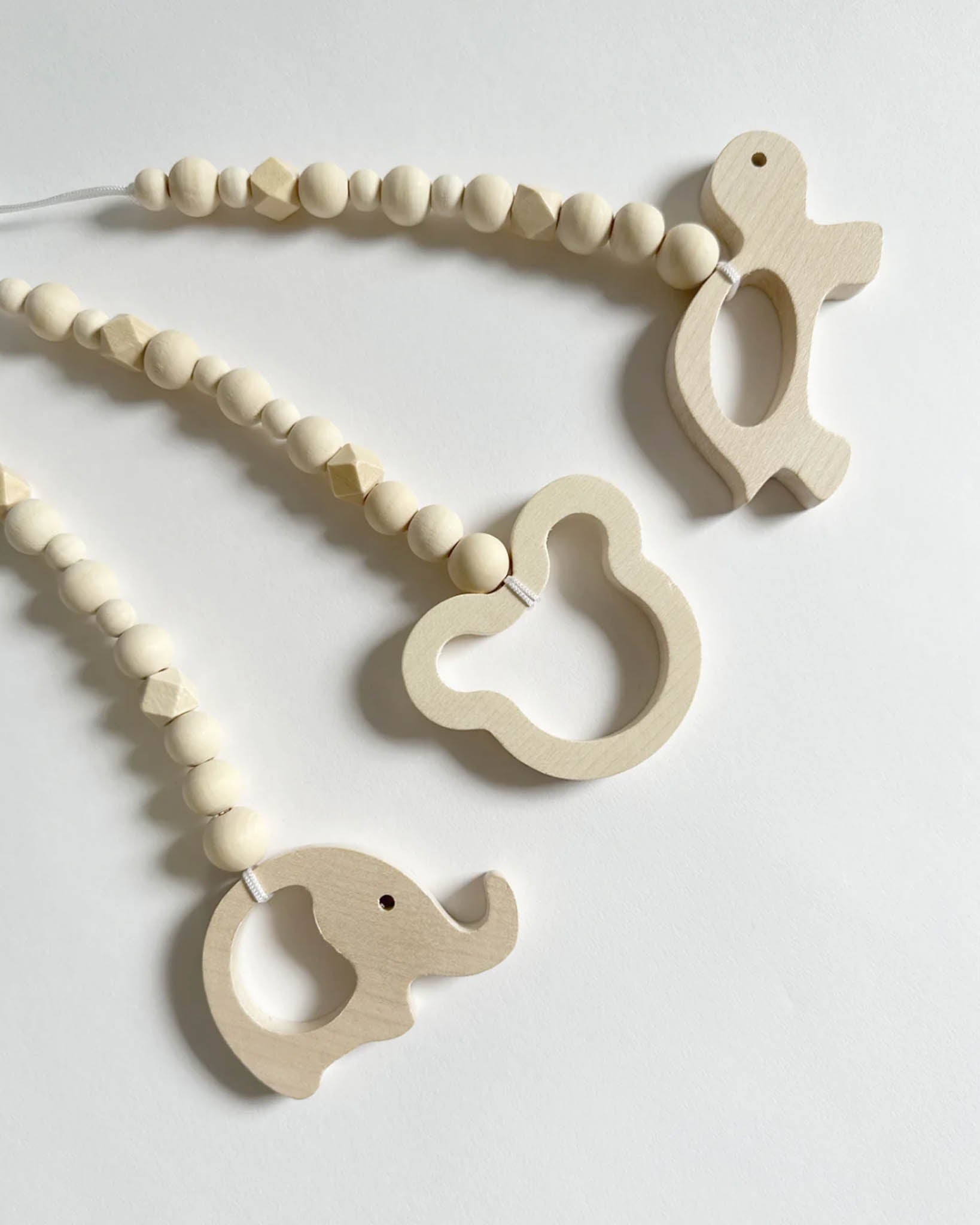 Unique Love - Babywippe mit Spielbogen | ivory white - Leja Concept Store
